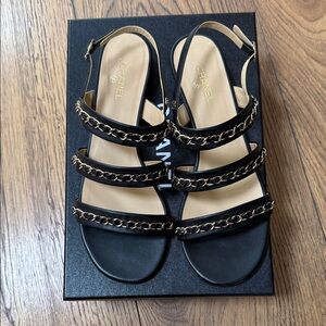 CHANEL Black Sandals with Gold Chain Accents